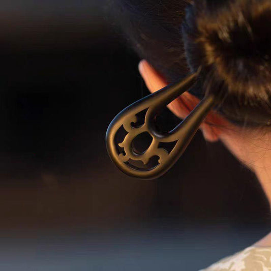 Close-up of Polished Ebony Hair Stick with Deep Black Finish