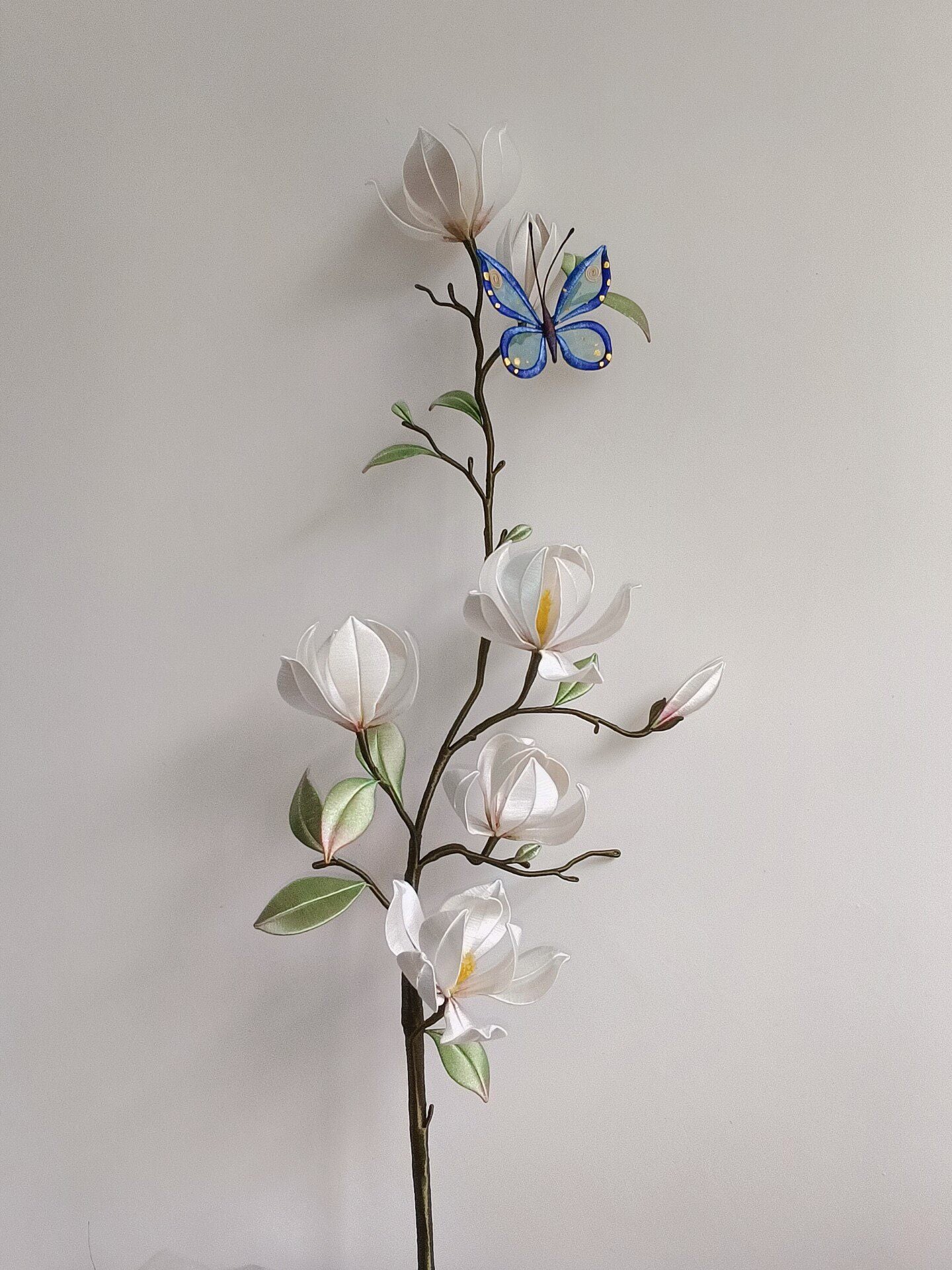 Luxury 3D embroidery floral branch featuring artisanal silk-thread magnolia blossoms for high-end home vase arrangements.