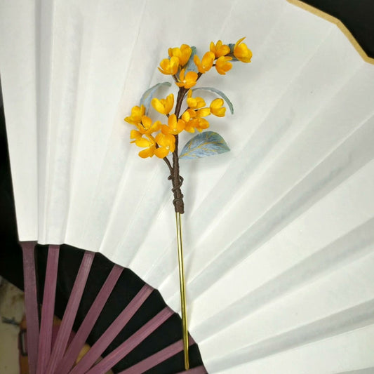3D silk velvet floral hair accessory featuring yellow Osmanthus clusters made with traditional artisanal Ronghua techniques.