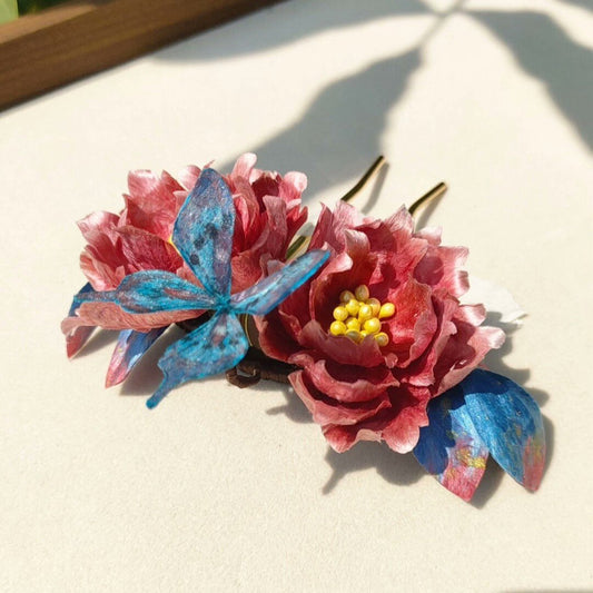 3D silk velvet hair accessory featuring two blooming peonies and artistic blue foliage made with traditional Ronghua techniques.
