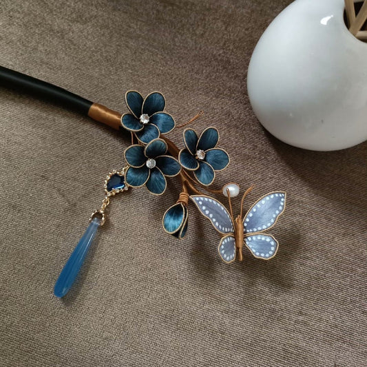 Handmade Ronghua blue plum blossom and butterfly velvet flower hairpin with natural mulberry silk, crystals, pearl, and blue tassel