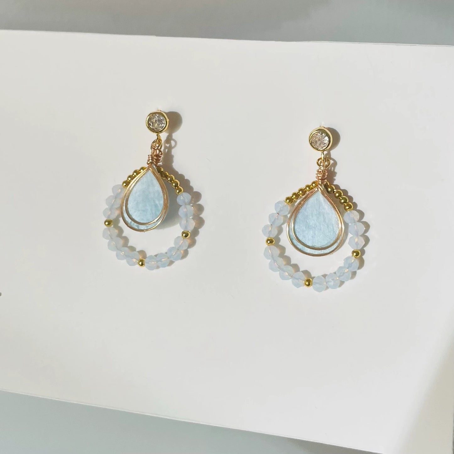 Handmade Ronghua aquamarine teardrop drop earrings in mulberry silk velvet with crystal bead circle and gold details
