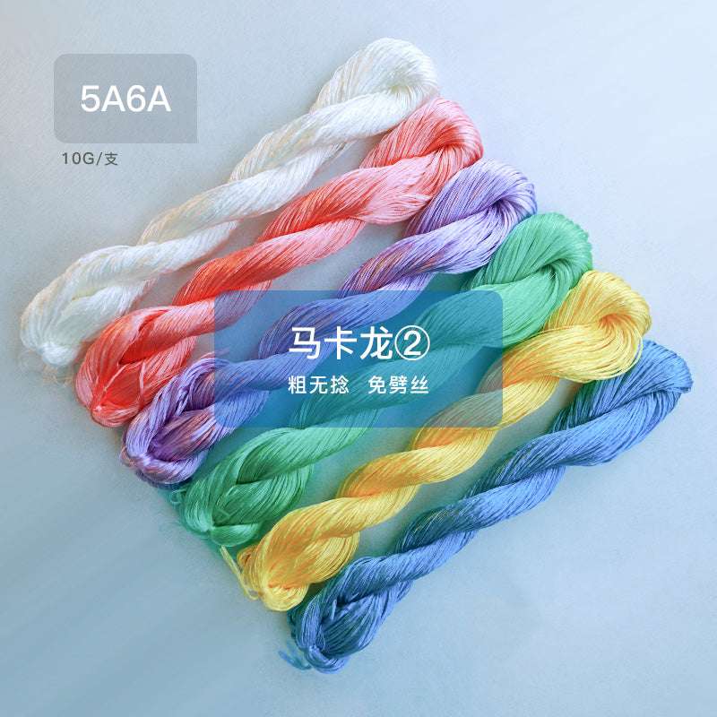 Six skeins of Suzhou embroidery thread in the Macaron 2 color set, including vibrant pastel orange, purple, green, and blue for modern craft projects.