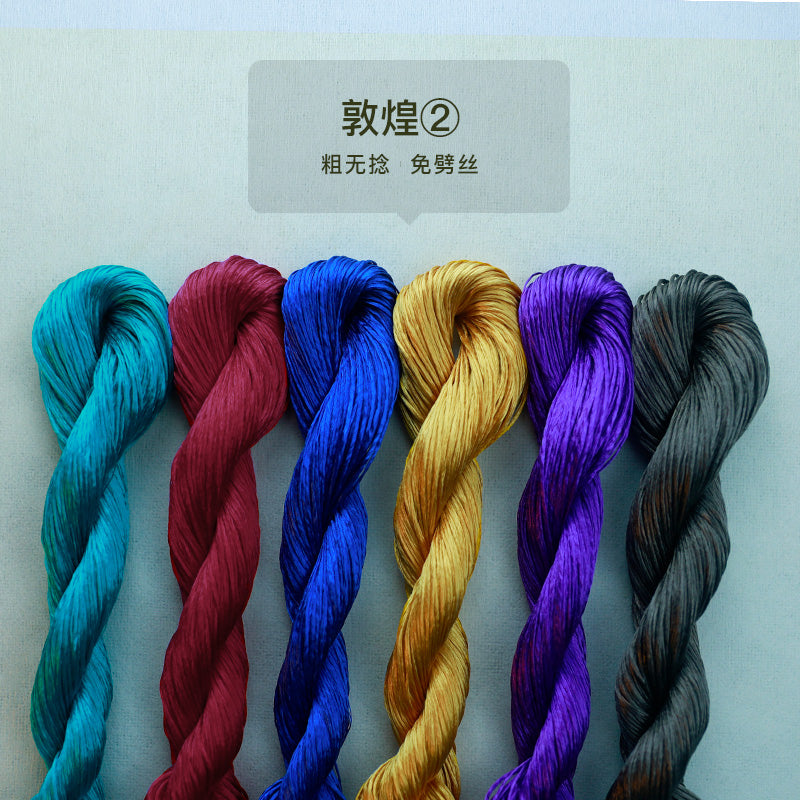 A set of six 10g bundles of thick, untwisted mulberry silk thread from the "Dunhuang 2" collection, showcasing a vibrant color palette of jewel tones and deep hues.