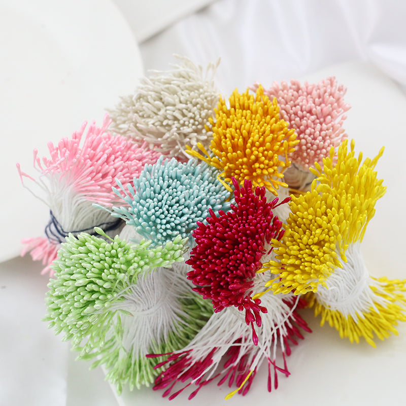 A vibrant collection of colorful 1.5mm artificial flower stamens bundled together for DIY projects.