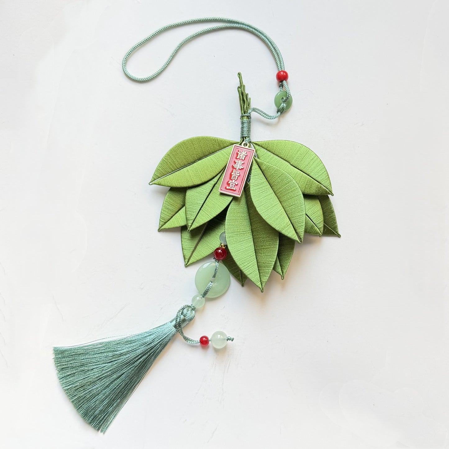 Chanhua DIY pomelo leaf tassel pendant kit finished with jade ornament and 'Wishing Everything Goes Well' tag.