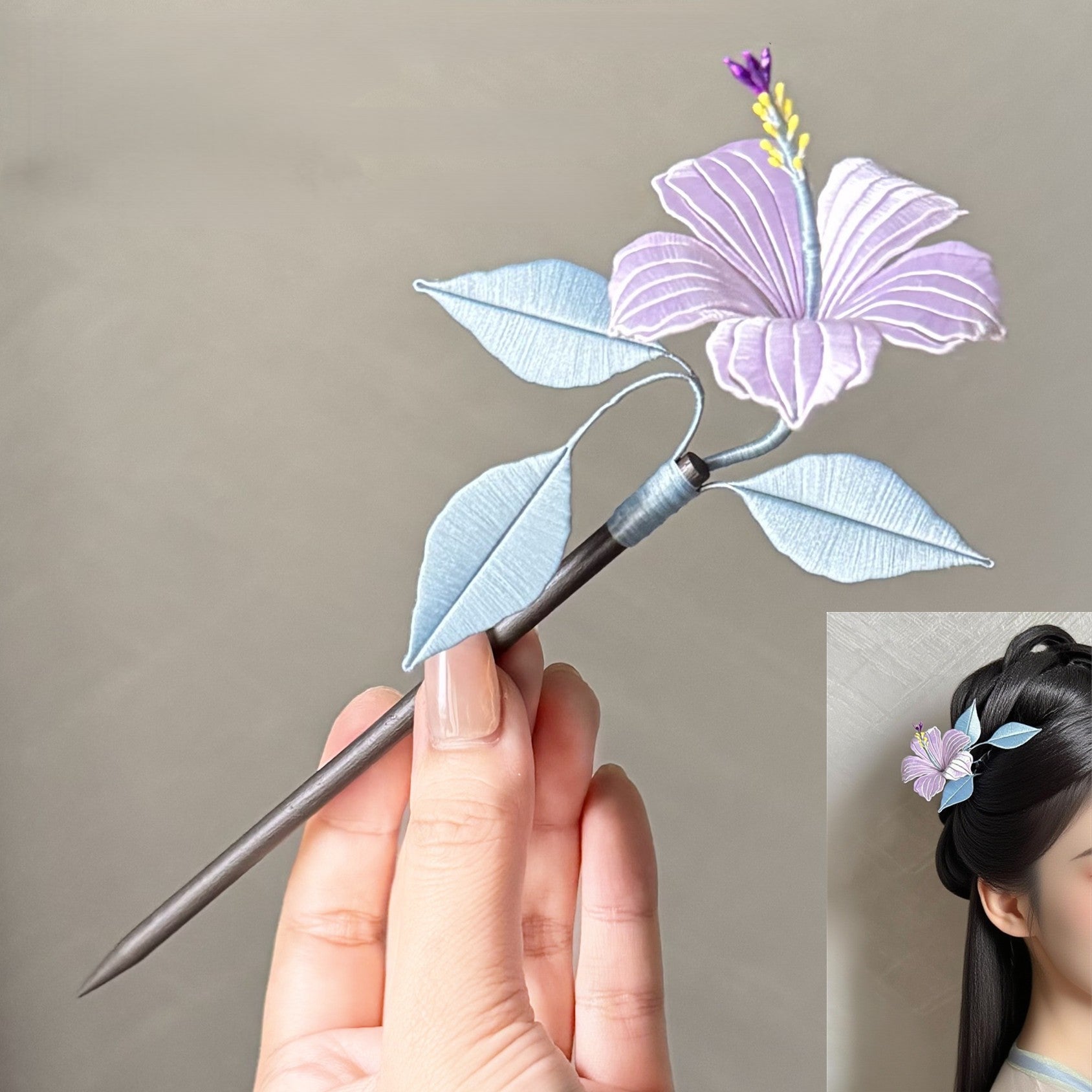 DIY Chanhua kit featuring a handmade lavender silk hibiscus flower hairpin with blue-toned leaves on a wooden base.