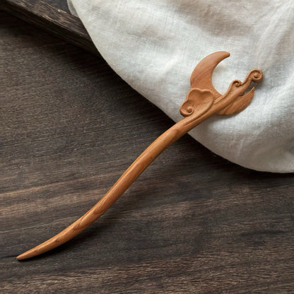 Natural peach wood 20cm hair stick with spring autumn moon cloud design on dark wooden background