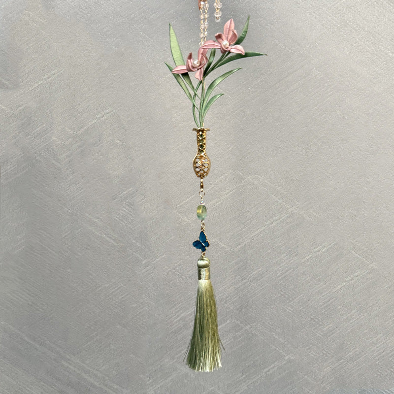 Orchid Vase Pendant Chanhua DIY Kit featuring pink silk-wrapped flowers in a gold vase with a long green tassel and blue butterfly charm.