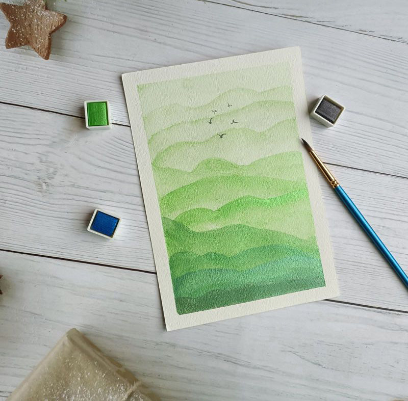 Hand-painted watercolor artwork demonstrating the natural blending and vibrant metallic finish of solid pearl watercolors, ideal for fine art.