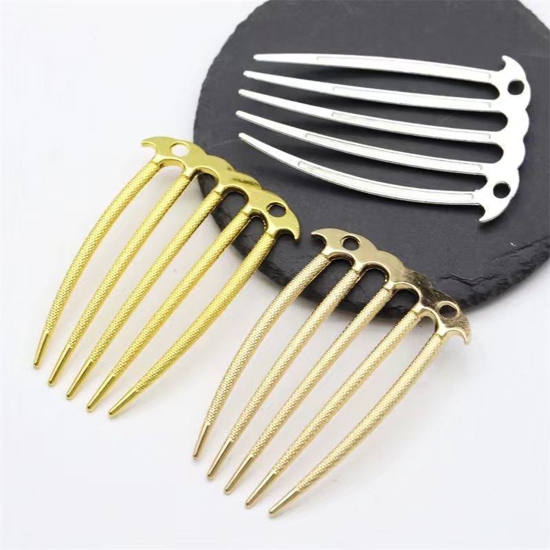 An assortment of textured metal hair comb bases in gold, silver, and light gold for DIY jewelry making.