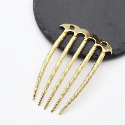 A durable 5-prong metal updo fork with pierced holes for attaching beads and charms.