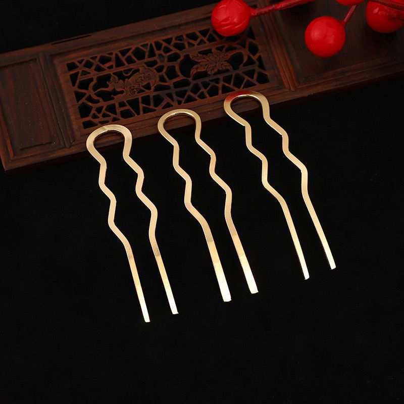 Minimalist gold 2-prong hair forks, a versatile finding for handmade bridal hairpins.