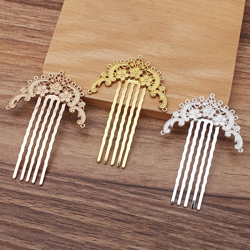 Set of 3 Chinese-style 5-tooth plum blossom hair combs in gold, rose gold and silver electroplated copper, ornate floral filigree design, 60×45mm, displayed on wooden background