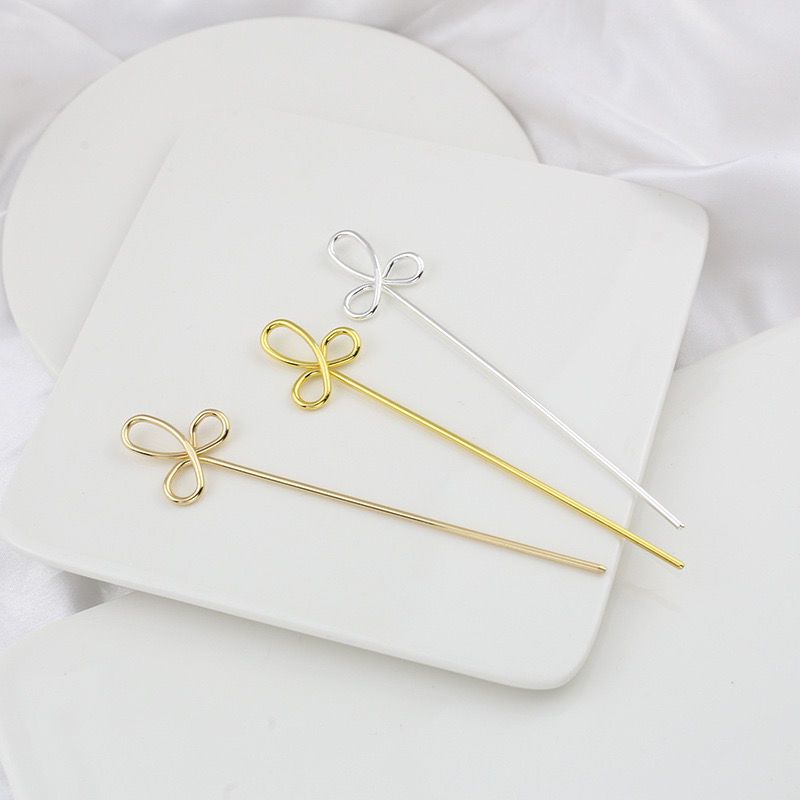 Set of 3 Chinese knot hair sticks made of copper, 125mm long, in gold, silver electroplated finish, simple bow-knot design, displayed on white round plate with silk background