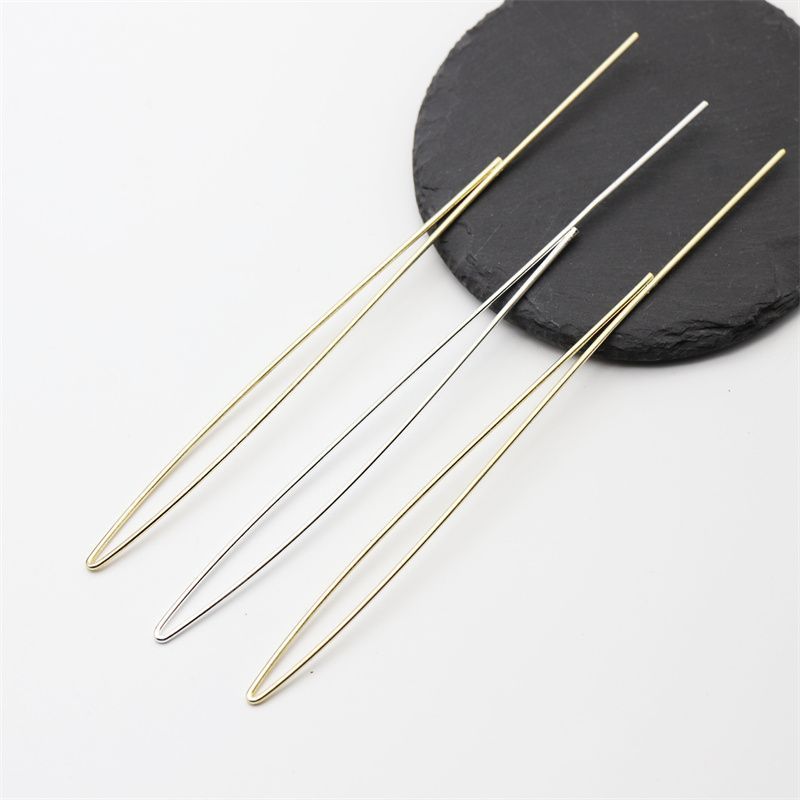 Set of 3 U-shaped Chinese hair sticks made of copper, 17cm long, in gold and silver electroplated finish, minimalist open-loop design, displayed on black slate round plate