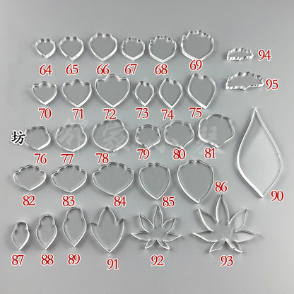 An assortment of clear acrylic petal and leaf shaping templates for wire wrapping, numbered 64 through 95.