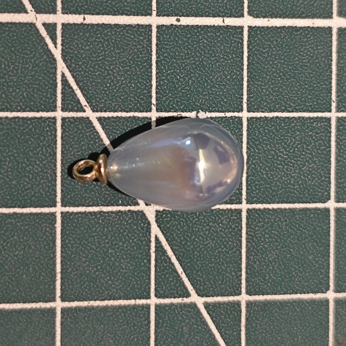 Single blue teardrop mermaid charm, for DIY jewelry and hair accessory making.