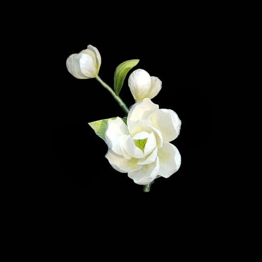 Handcrafted white Jasmine Ronghua brooch featuring soft velvet-textured silk petals and a long gold-tone pin.