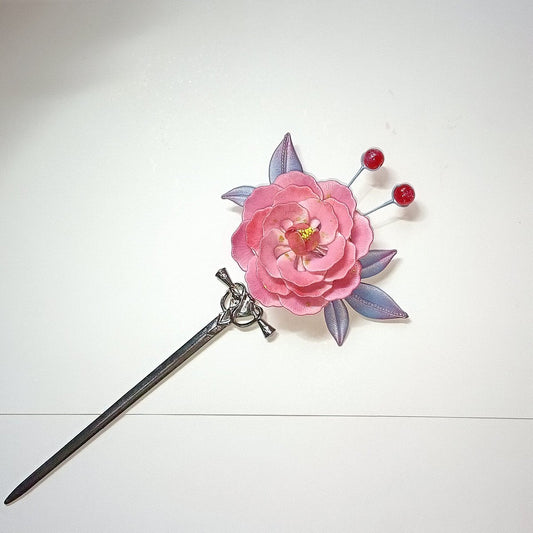 Handcrafted Chanhua thread-wrapped hairpin featuring a large pink and blue gradient peony blossom with purple leaves and red bead accents on a white background.