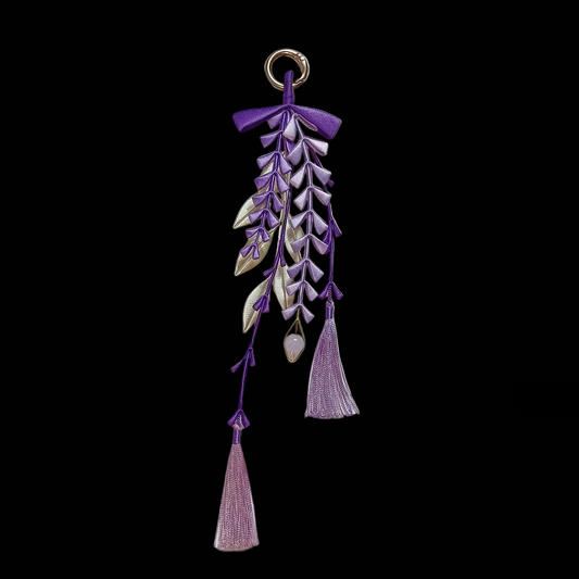 Close-up of Chanhua wisteria pendant showing thread-wrapped purple florets in deep violet and soft lavender tones with cream-gold leaf detail