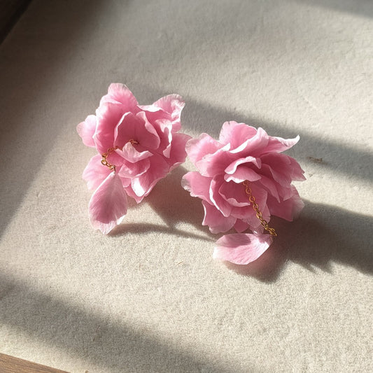 3D silk velvet floral earrings depicting blooming sakura flowers made with traditional artisanal Ronghua techniques.