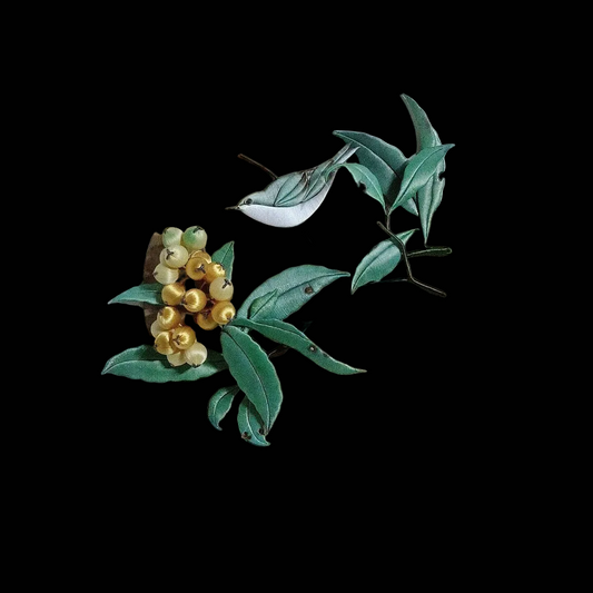 Close-up of luxury thread-wrapped floral art showing detailed craftsmanship and texture.