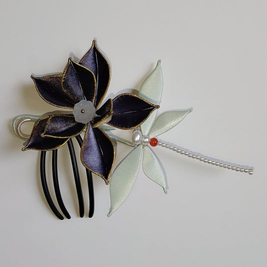 Handcrafted dark lotus Chanhua hairpin featuring deep purple thread-wrapped petals with gold edges, a dragonfly motif with pearls, and a black hair comb base.