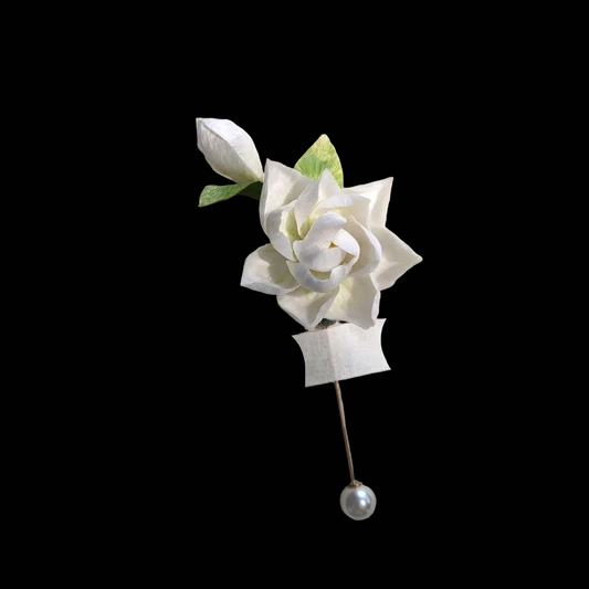 Handcrafted Ronghua Gardenia brooch featuring soft white velvet-textured silk petals and a gold-tone pin.