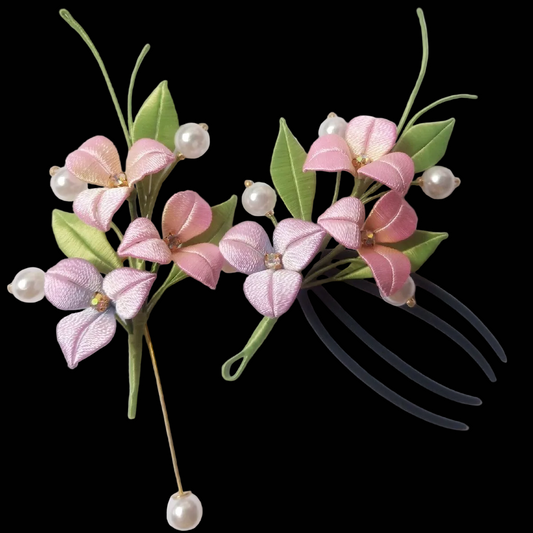 Handcrafted Chanhua Bougainvillea brooch and hair clip featuring vibrant magenta thread-wrapped petals and green leaves.