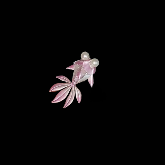 
Close-up of Chanhua goldfish brooch showing thread-wrapped pink ombre petal fins fading from deep pink to pale silver
