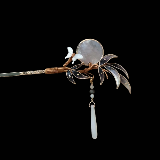 
Ronghua handmade bamboo and moon hairpin with dark grey-brown velvet leaves, translucent round moon disc in copper wire, crystal butterfly, and jade drop pendant on a gold twisted pin,