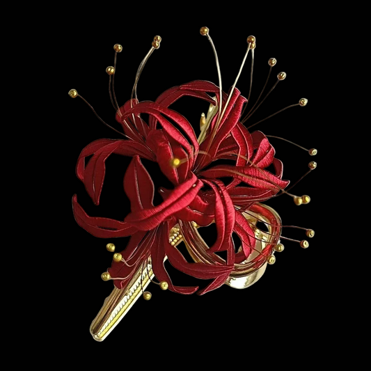 Handcrafted Chanhua spider lily hair claw featuring vibrant red thread-wrapped petals and stamens.