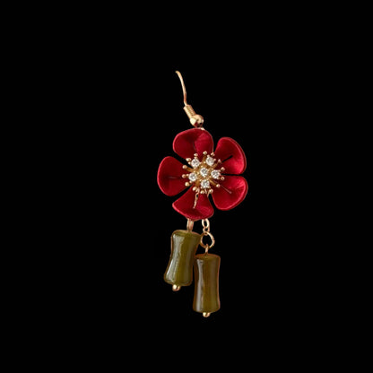 Handmade Chanhua red plum blossom earrings with silk thread flowers and green bamboo drops