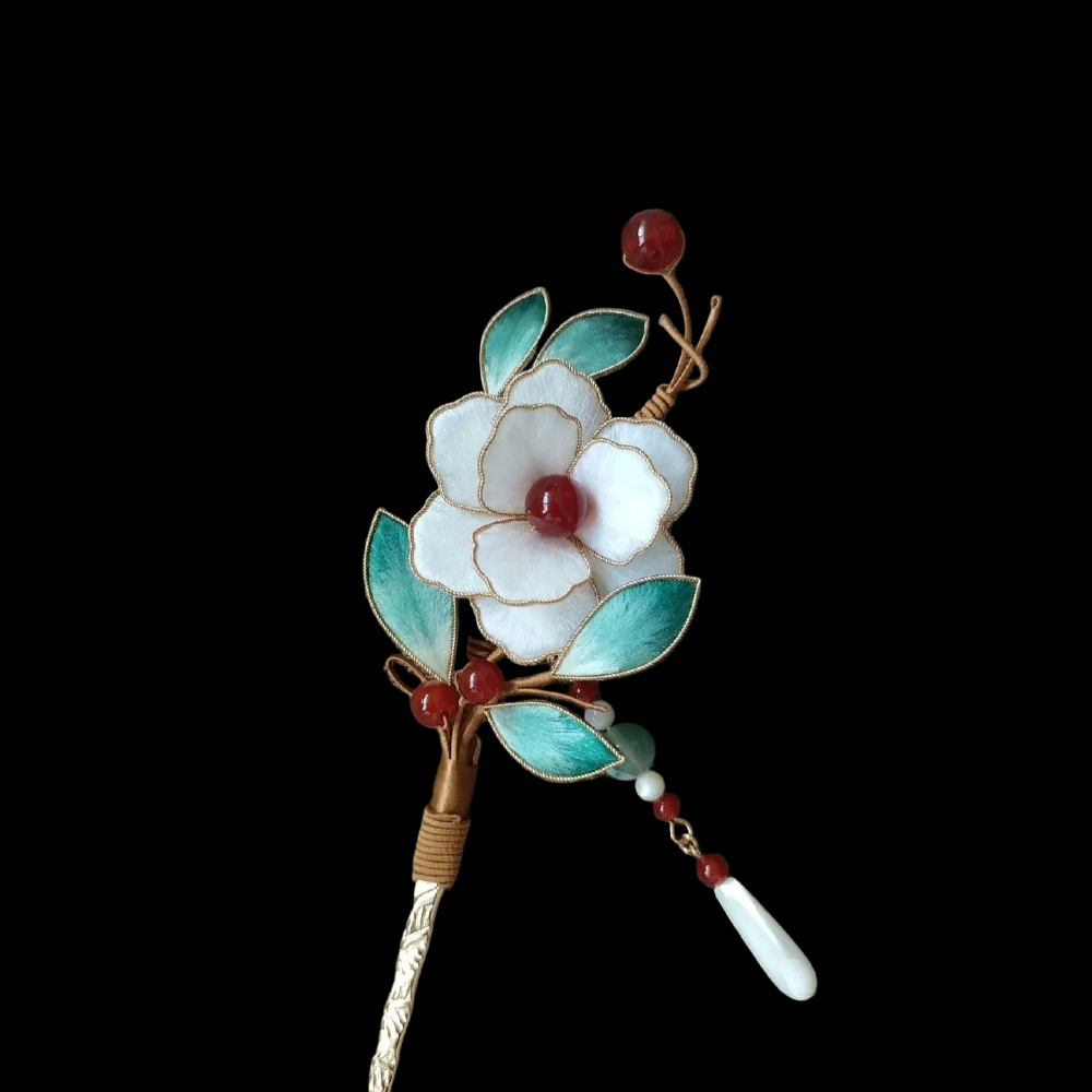Handmade Ronghua white camellia hairpin with natural mulberry silk velvet flower, turquoise leaves, red bead center, and bead tassel on gold stick