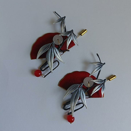 Luxury 3D thread-wrapped pin depicting a traditional oriental fan and bamboo design made with artisanal Chanhua techniques.