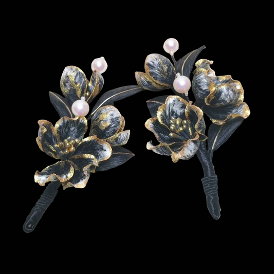 Handcrafted black Ronghua hair accessory with gold-edged silk petals and pearl accents on a flexible base.