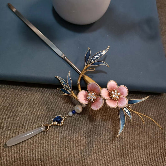 Handmade Ronghua pink and blue plum blossom velvet flower hairpin with natural mulberry silk, crystal centers, gold wire, and white jade tassel