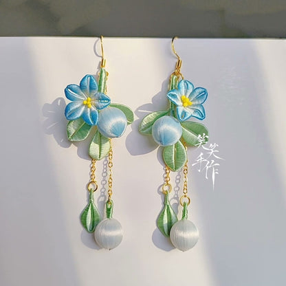 Handmade Chanhua flower and natural freshwater pearl dangle earrings with 925 silver hooks, perfect for elegant occasions.