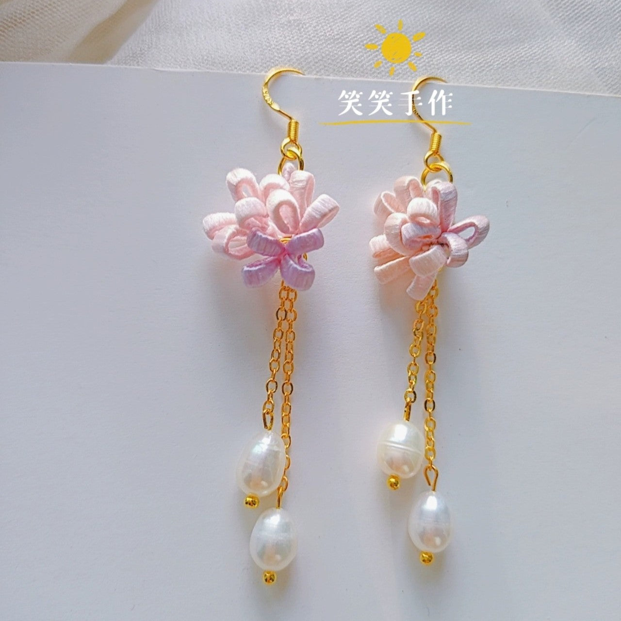 Handmade red Chanhua flower earrings with natural freshwater pearls and 925 sterling silver hooks.