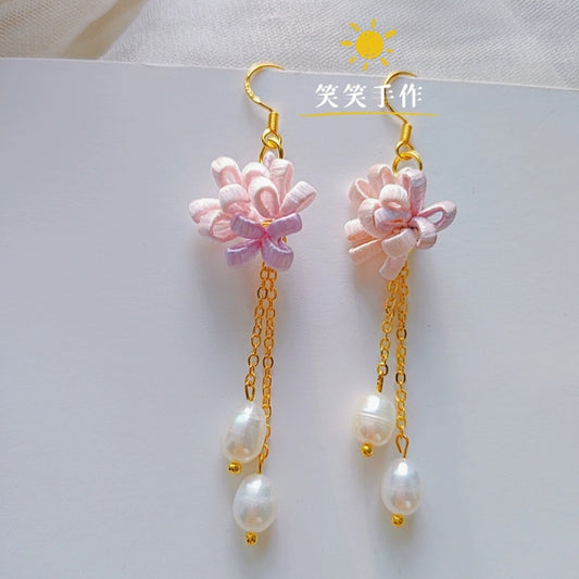 Handmade red Chanhua flower earrings with natural freshwater pearls and 925 sterling silver hooks.