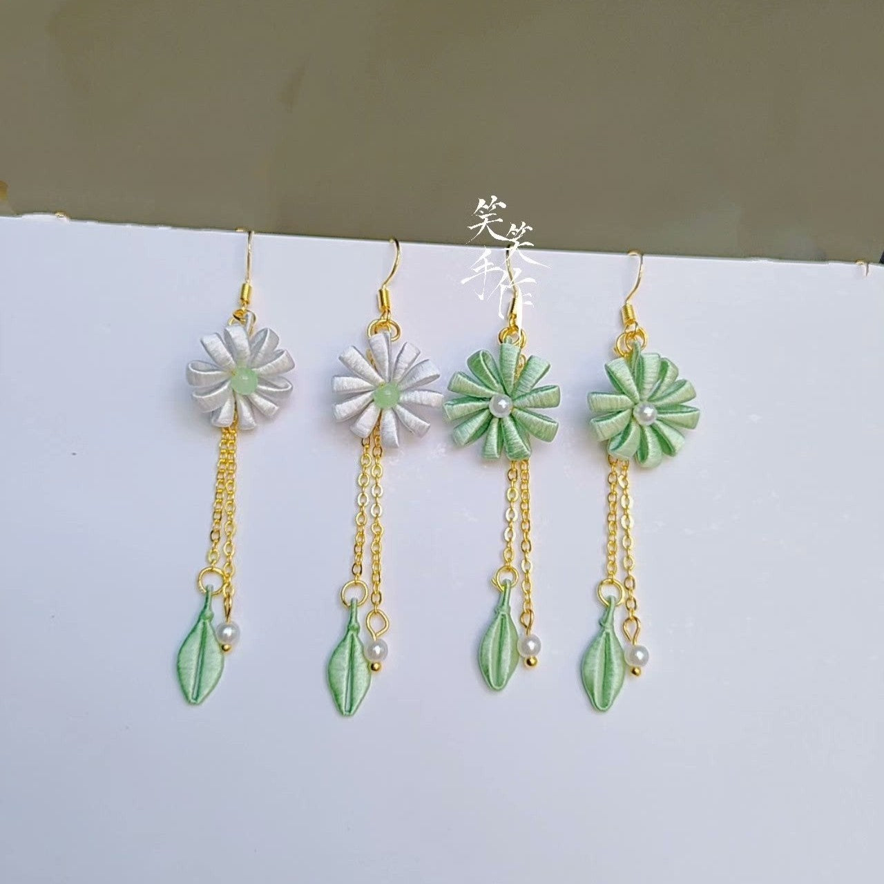 Elegant Chanhua Handcrafted Earrings, Green & White Flower Design, Sterling Silver Earring Hooks, Genuine Pearls, Front View.