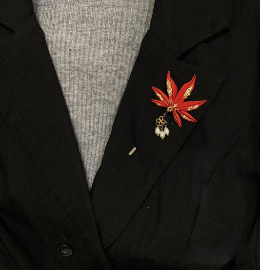 Handmade Chanhua maple leaf brooch in red thread leaf with gold accents and pearl drops, elegant autumn-inspired lapel pin