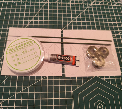 DIY flower craft supply kit featuring green velvet threads, copper wire, glue, stem wires, and paper templates for eucalyptus leaves.