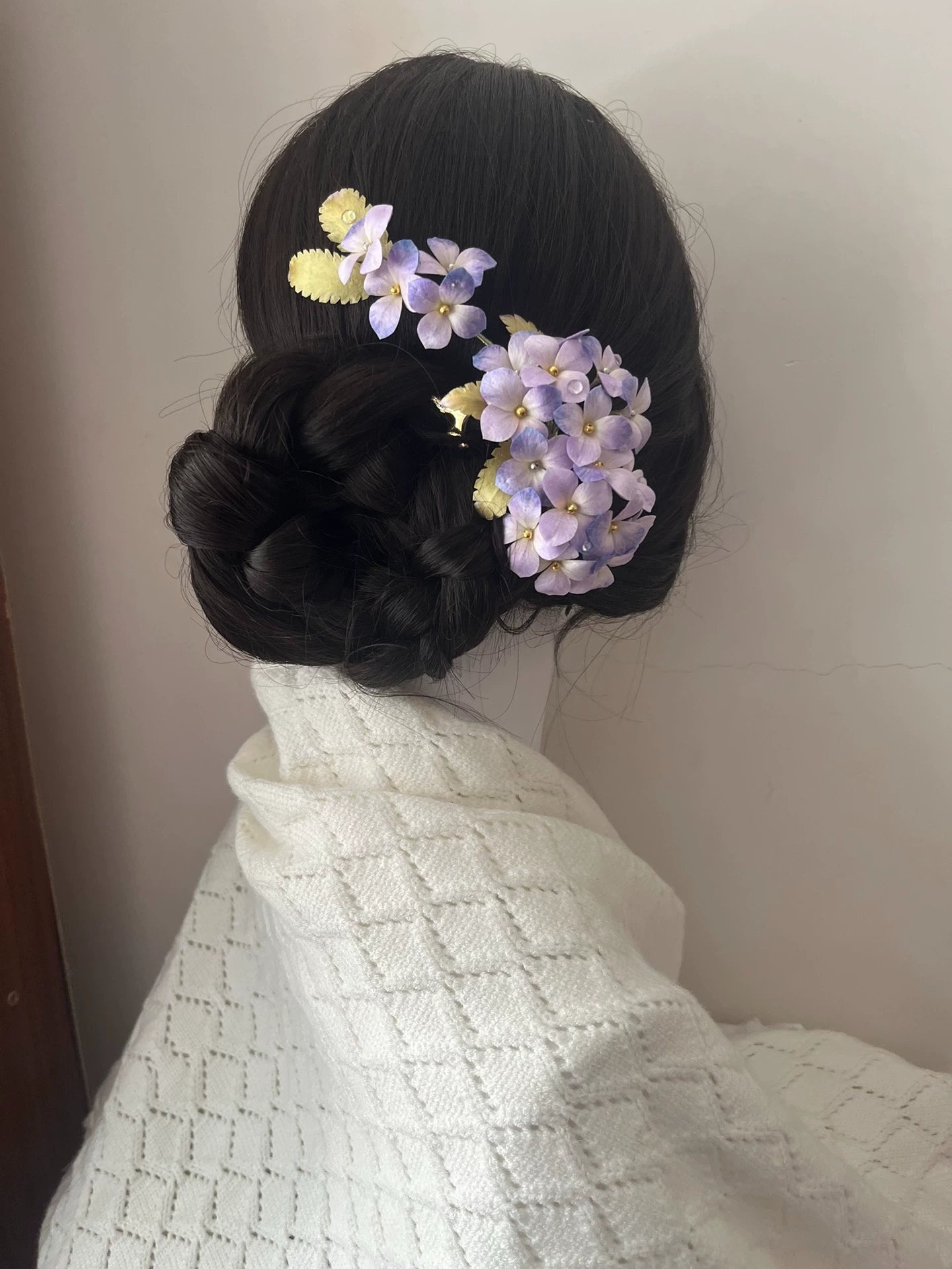 Handcrafted purple Hydrangea Ronghua silk hair accessories (large comb and clip) styled on a dark, elegant twisted updo.