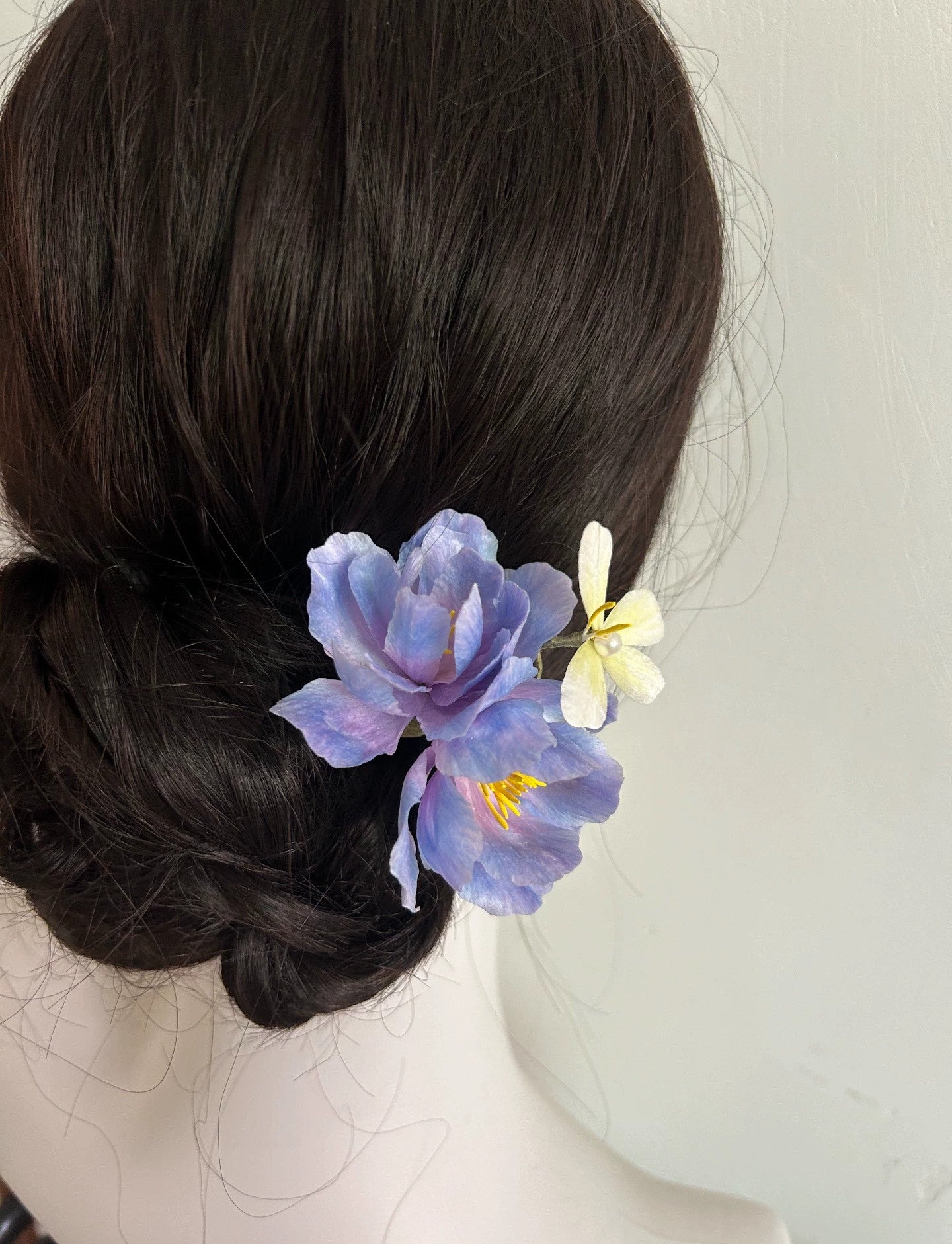 Handmade Ronghua blue-purple hibiscus mutabilis hairpin with natural mulberry silk thread worn in elegant dark hair updo