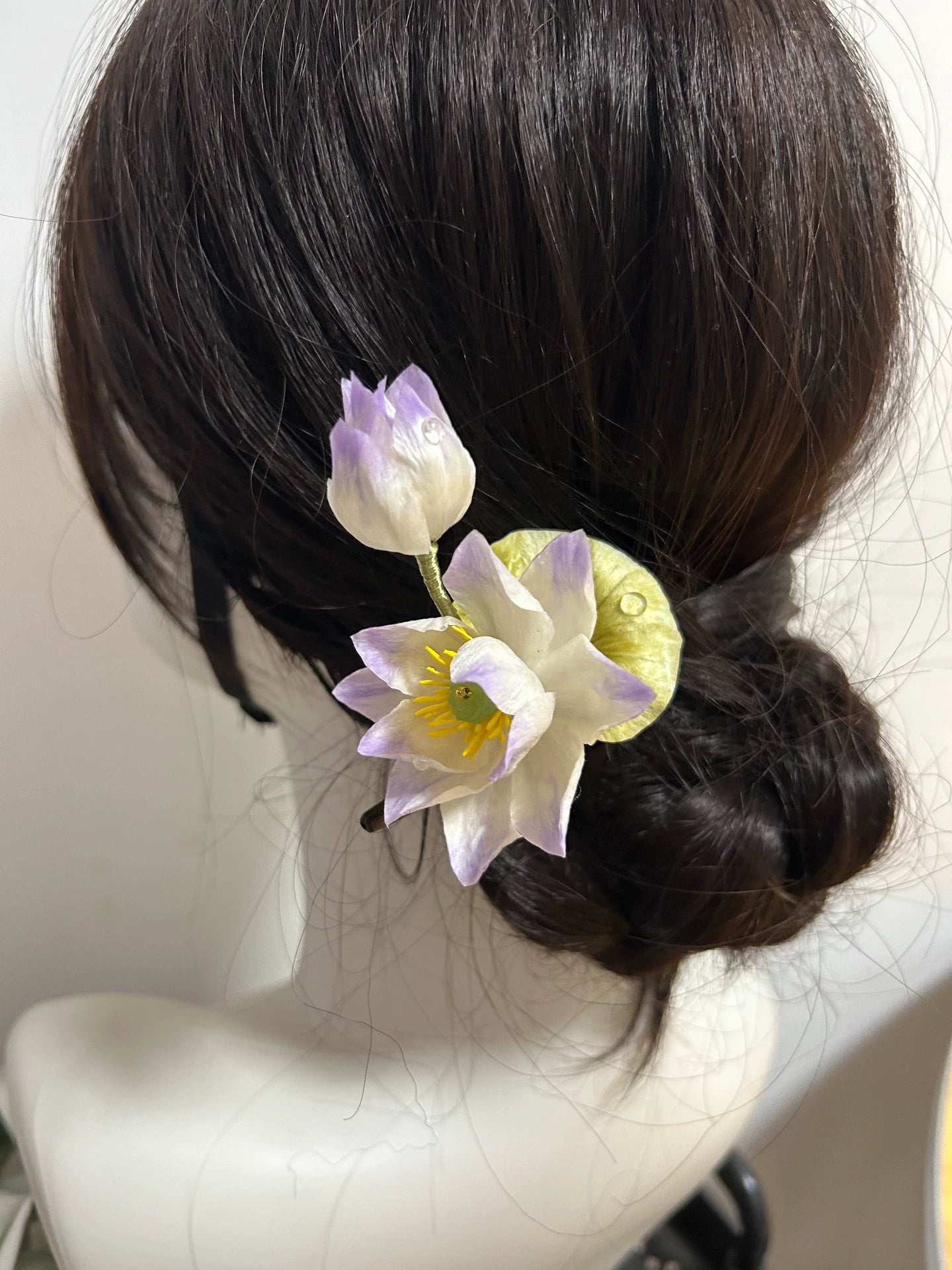Handmade Ronghua pale purple and white lotus hairpin with lotus leaf and pearl worn in elegant dark hair updo