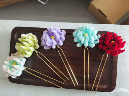 Handmade Ronghua chrysanthemum hair forks in mint, pink, lilac, green and red mulberry silk, shown together