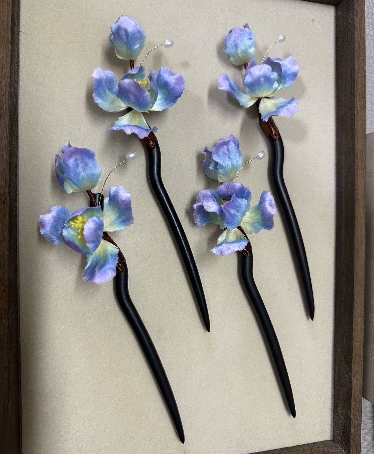 Handmade Ronghua blue iris hairpin set – two wooden hair sticks with mulberry silk velvet iris flowers and pearl details