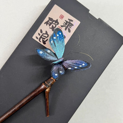 Handmade Ronghua blue fluttering butterfly hairpin in mulberry silk velvet with spring-mounted wings on wooden hair stick